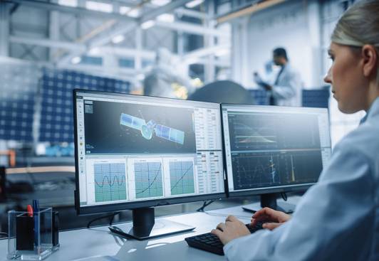 Female,Engineer,Uses,Computer,To,Analyse,Satellite,,Calculate,Orbital,Trajectory Female Engineer uses Computer to Analyse Satellite, Calculate Orbital Trajectory Tracking. Aerospace Agency International Space Mission: Scientists Working on Spacecraft Construction. Over Shoulder